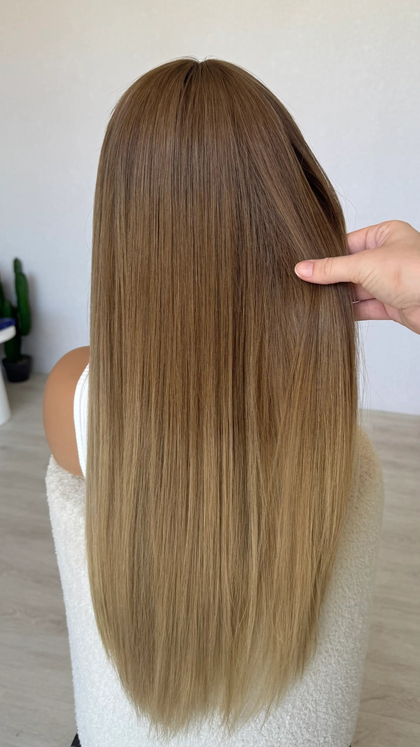 lace front human hair wig from back, holding biscuit blonde hair, straight hair, heat safe, glueless wig australia.