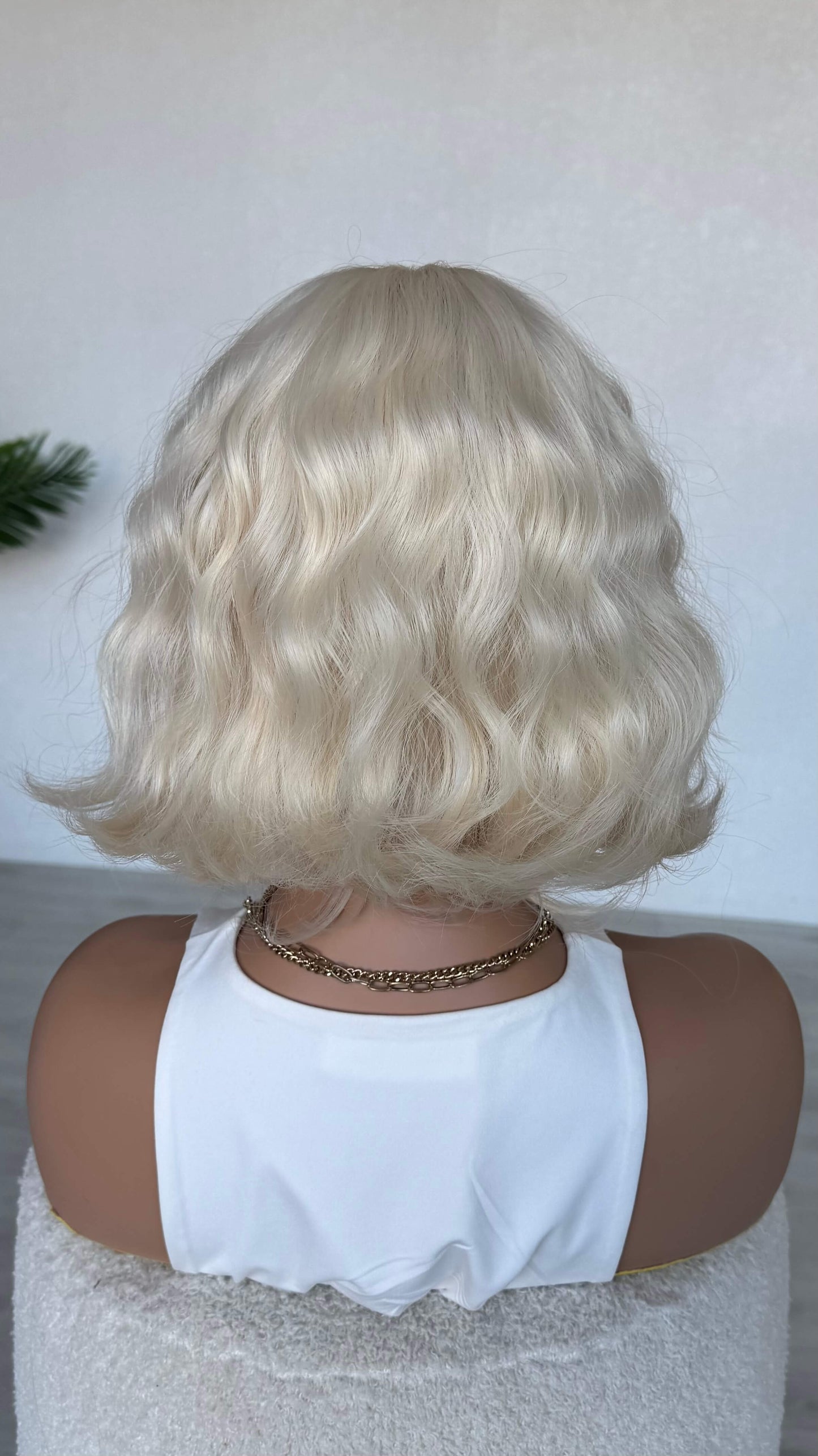 back view 10-12 inch wavy bob wig, synthetic heat safe.