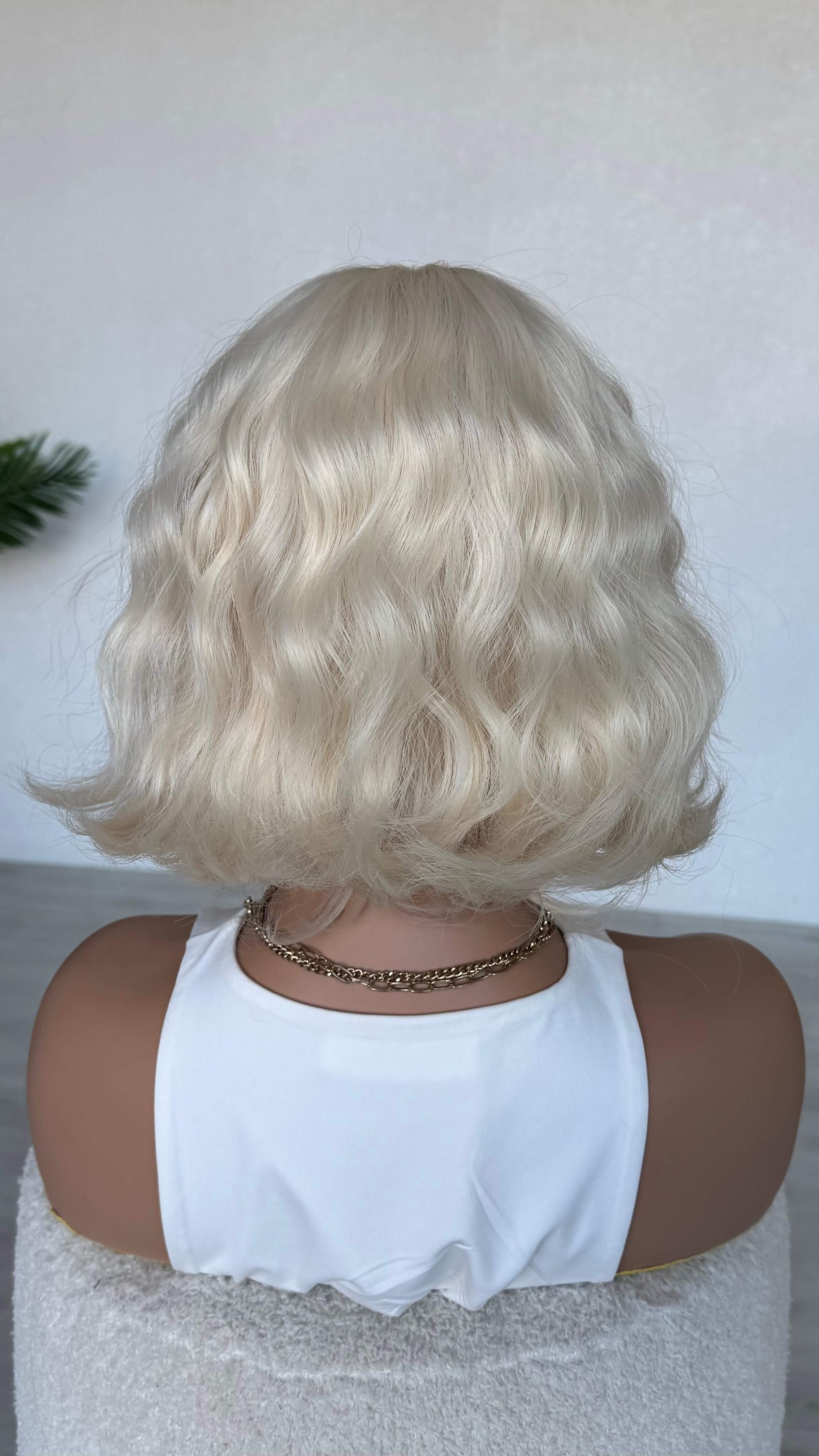 back view 10-12 inch wavy bob wig, synthetic heat safe.