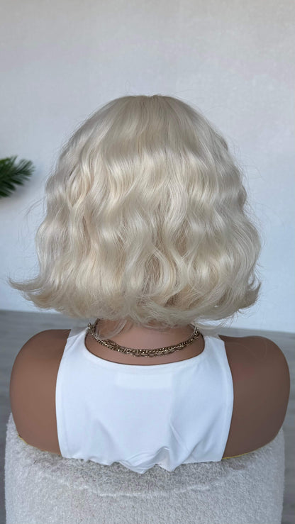 back view 10-12 inch wavy bob wig, synthetic heat safe.