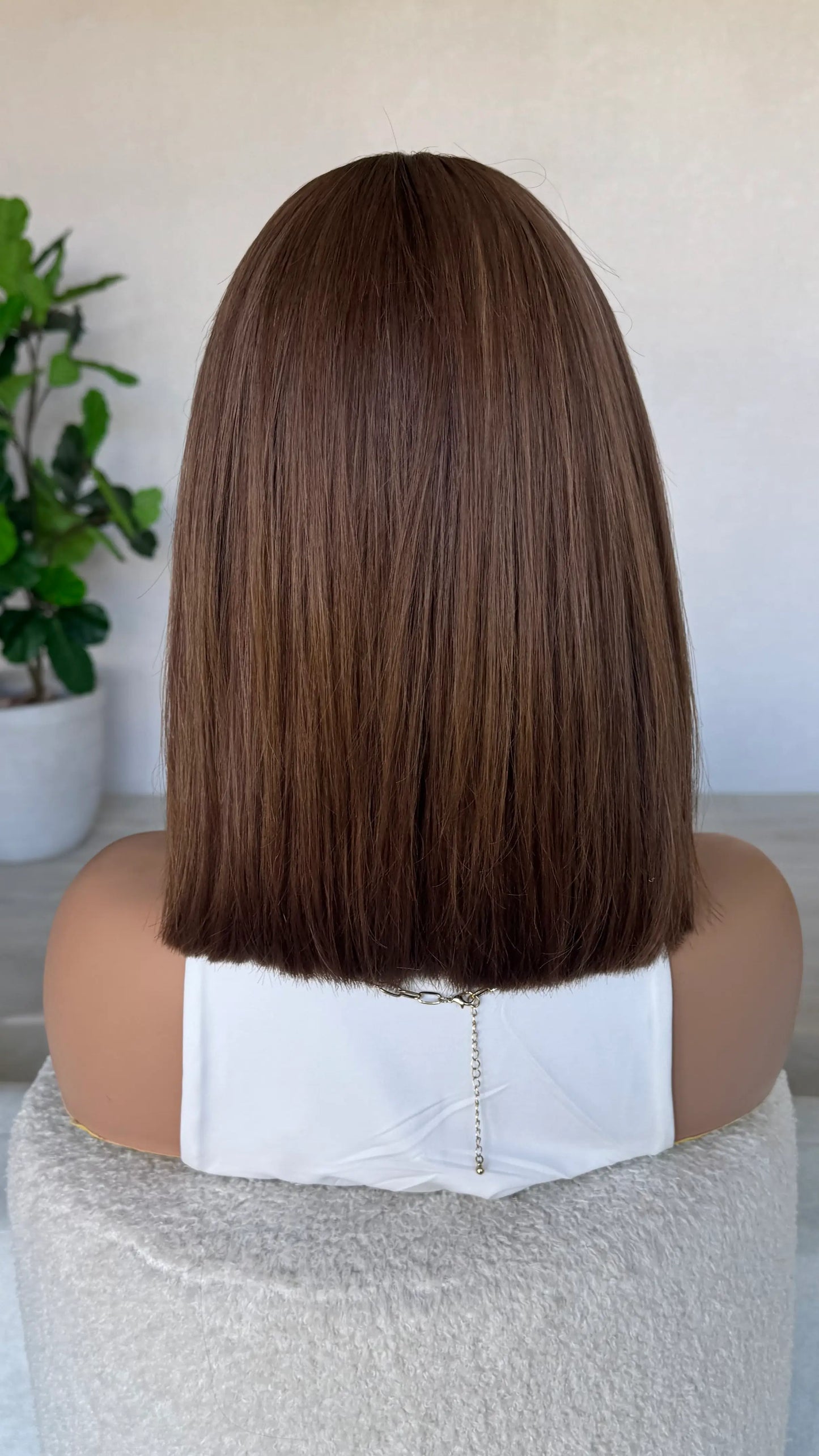 brazilian human hair wig, from the back view, 14 inch length blunt cut, bob length. natural hair wig australia.