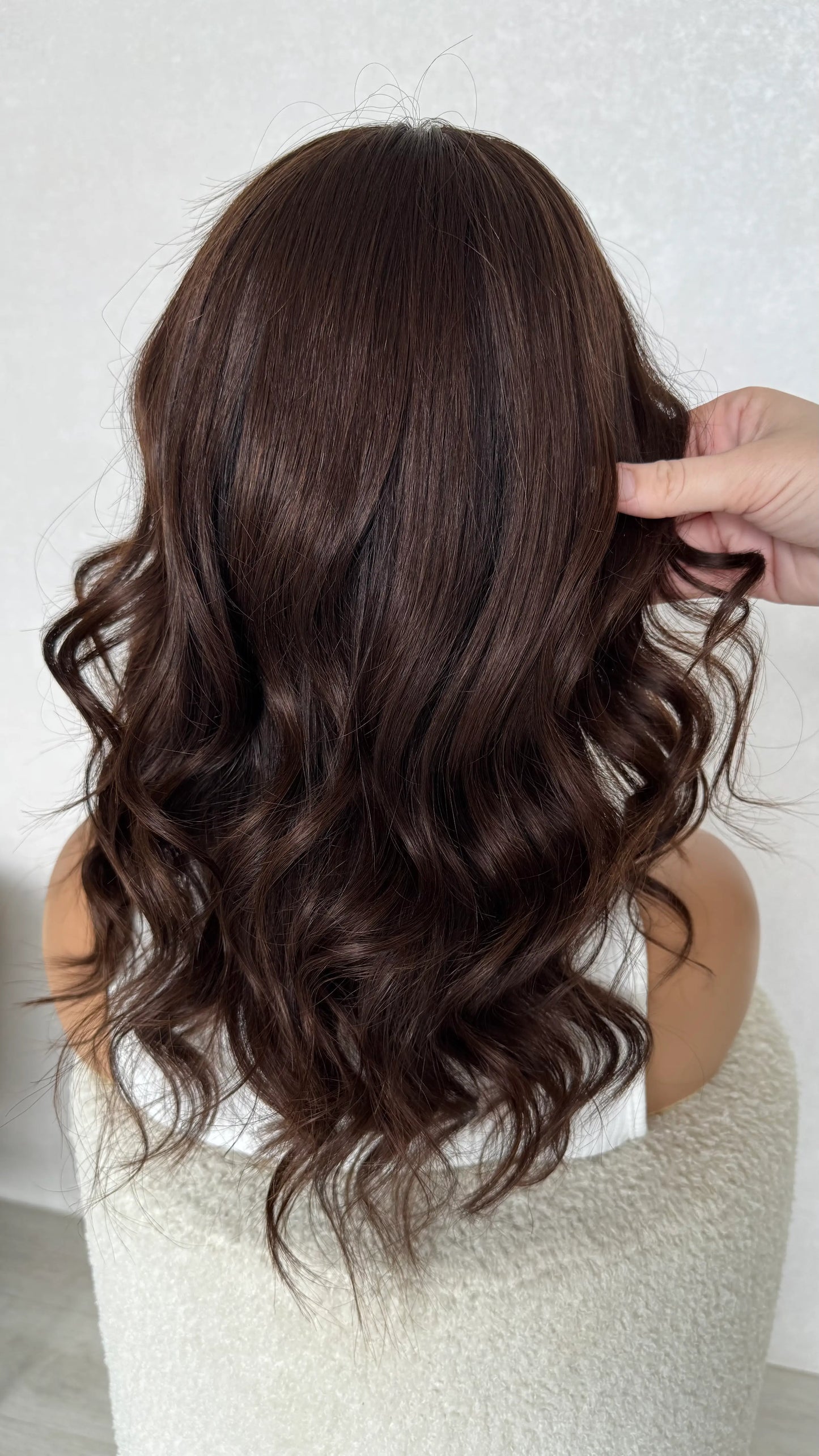 back view holding curled hair lace front wig australia.