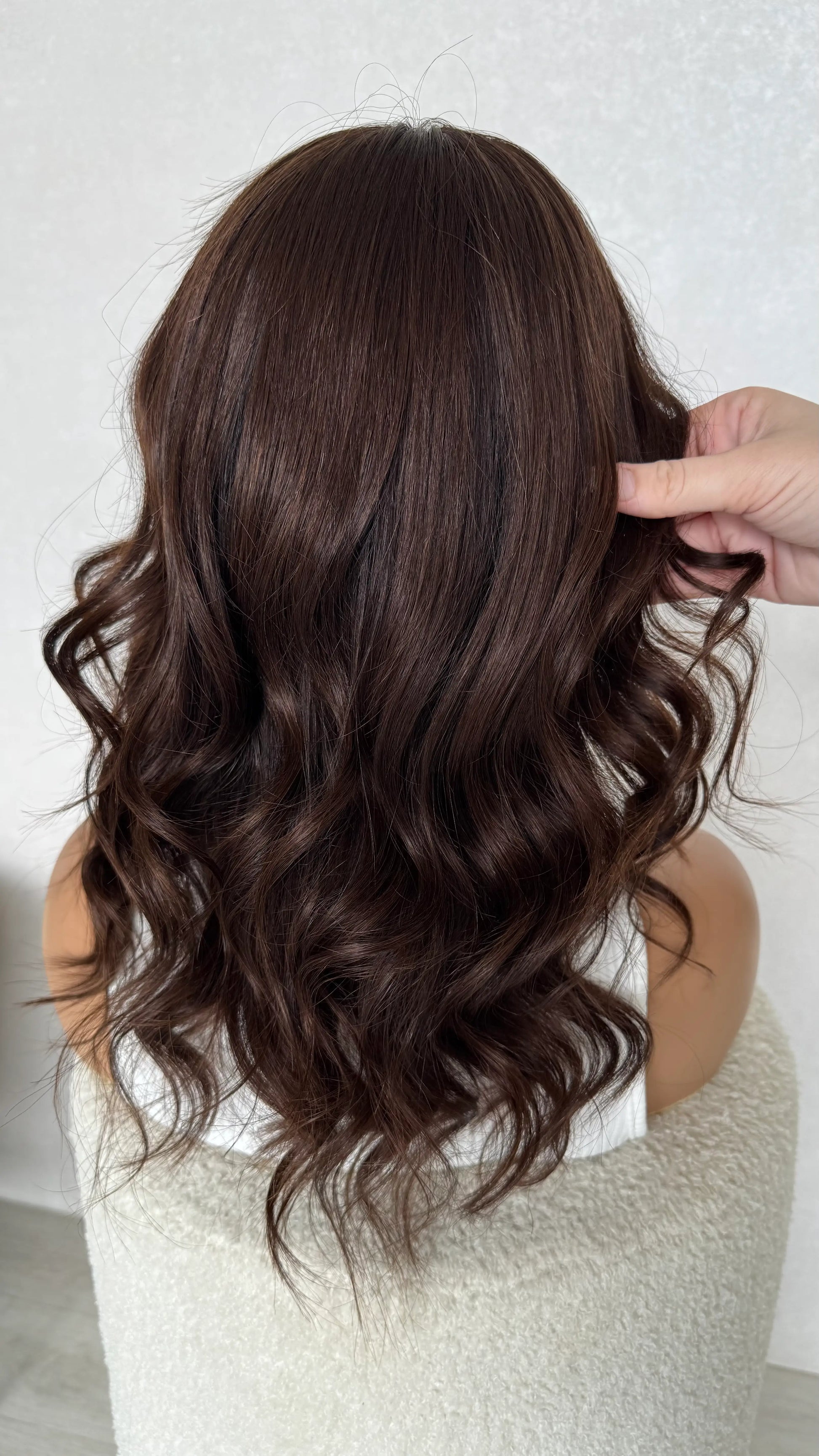 back view holding curled hair lace front wig australia.