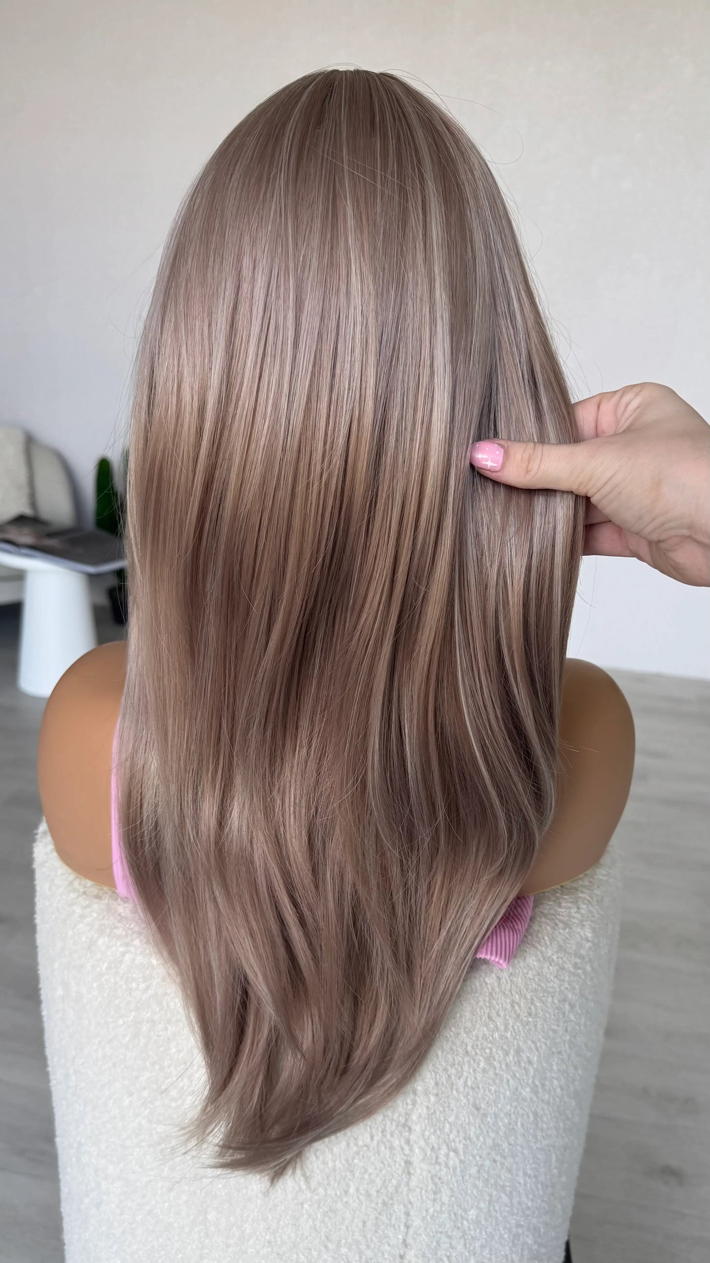 back view holding long lilac hair, heat safe synthetic wig australia.