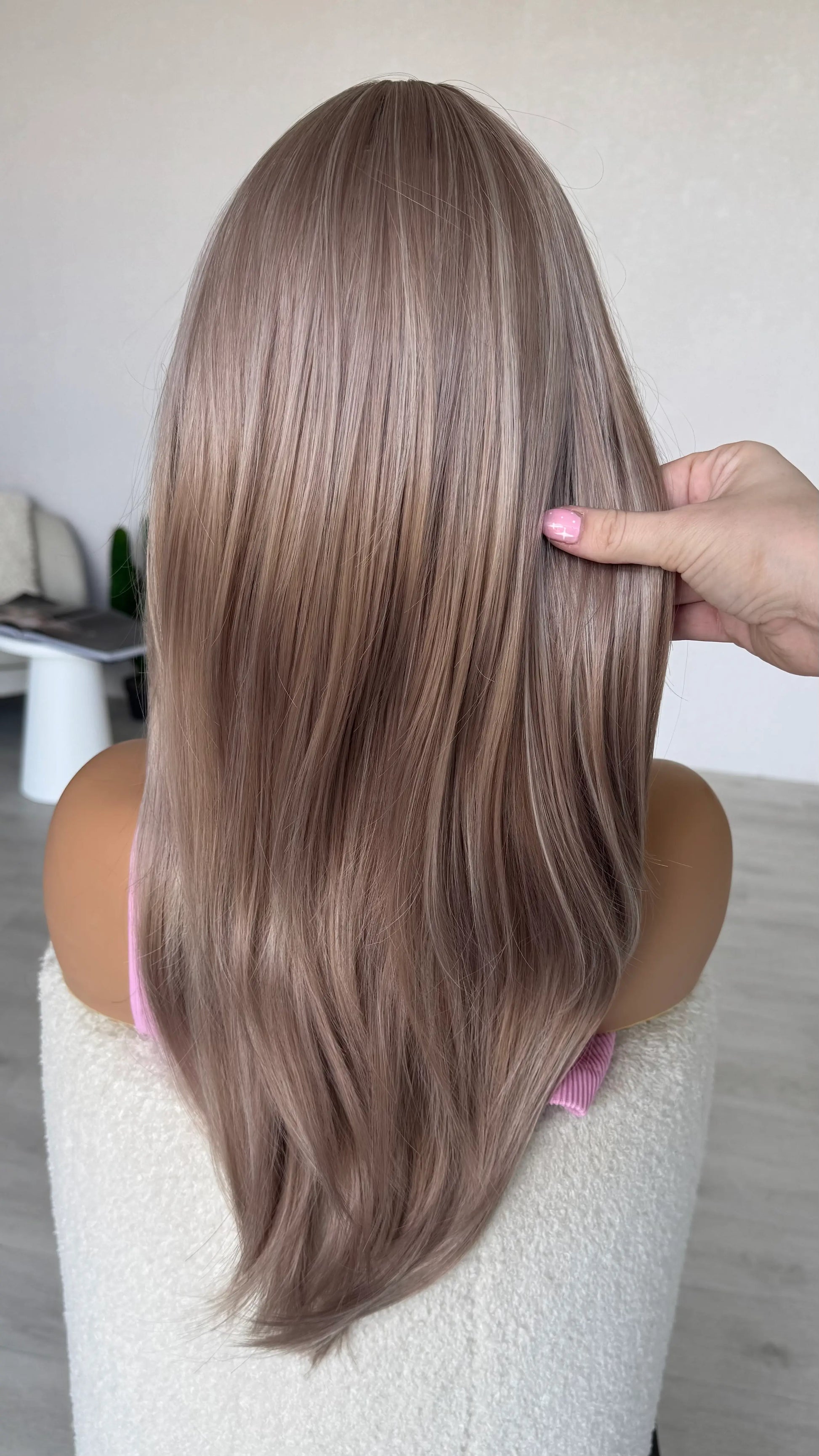 back view holding long lilac hair, heat safe synthetic wig australia.