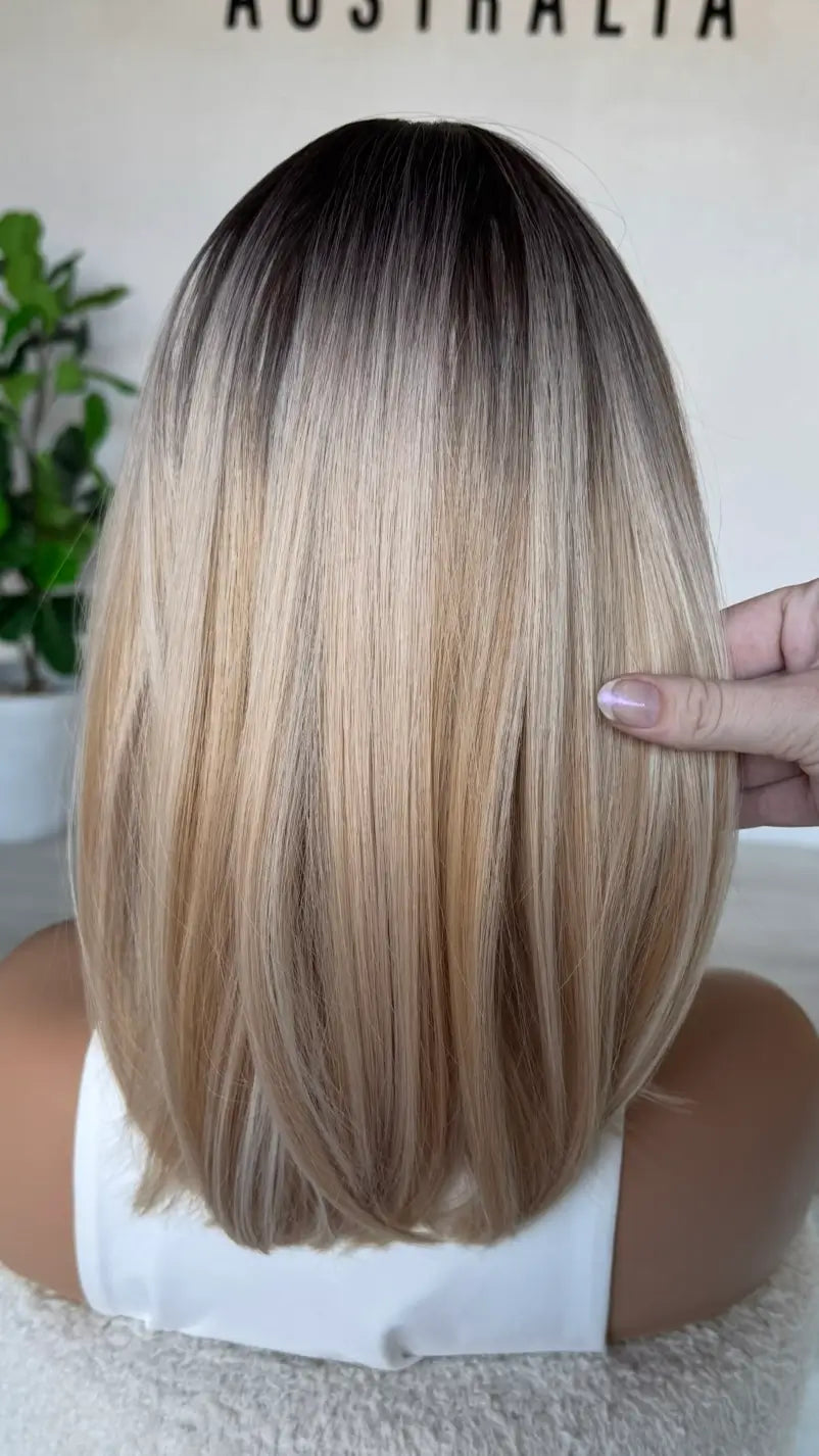 back view of connie wig, mixed blonde with dark root