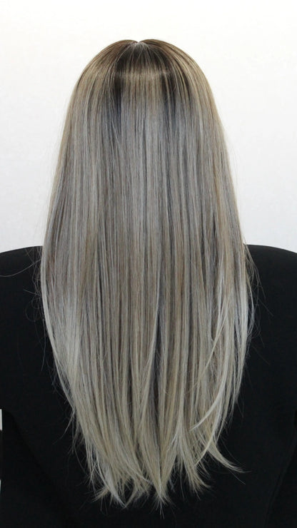 back view iconic wig, cool toned blonde with darker root.