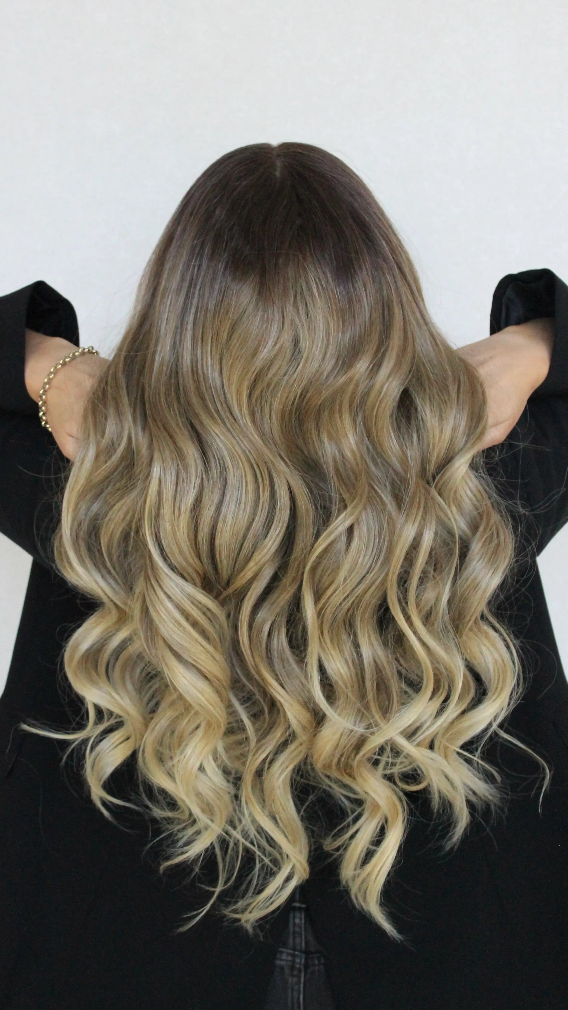 back view latte wig, ombre hair, behind view.