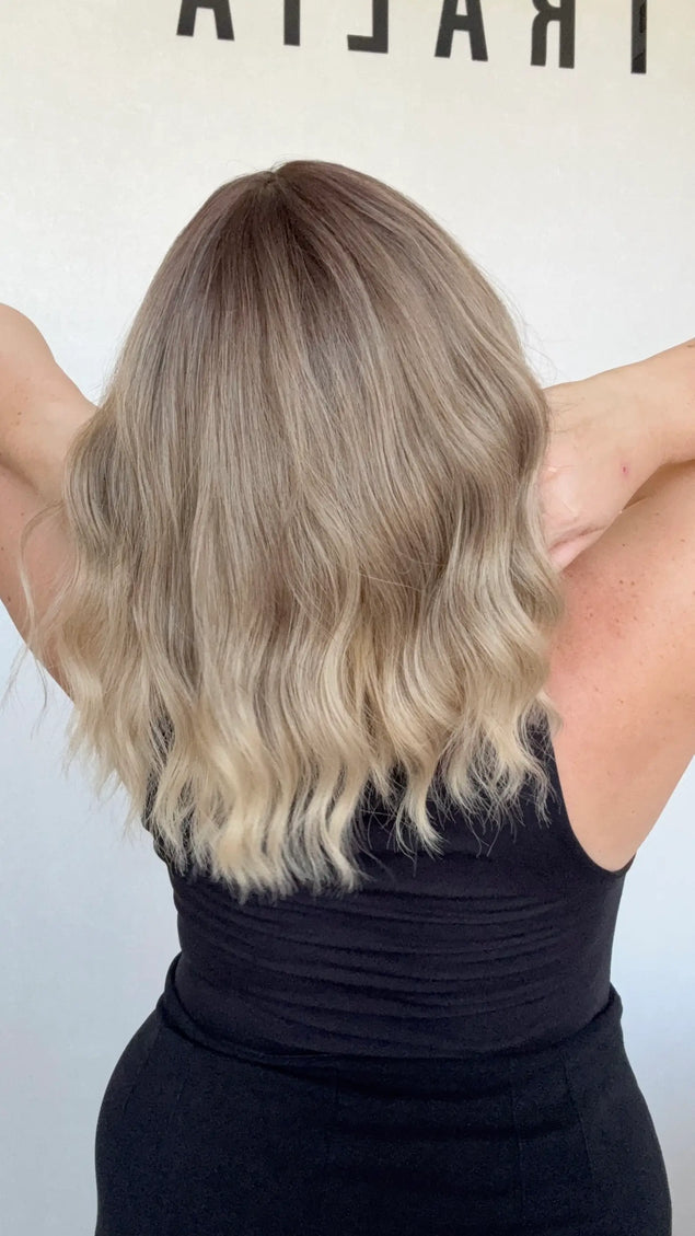 heat safe wavy ombre hair, middle part with fringe from back view.
