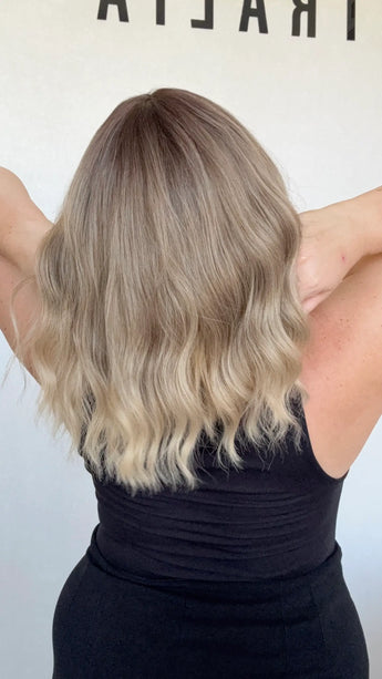 heat safe wavy ombre hair, middle part with fringe from back view.