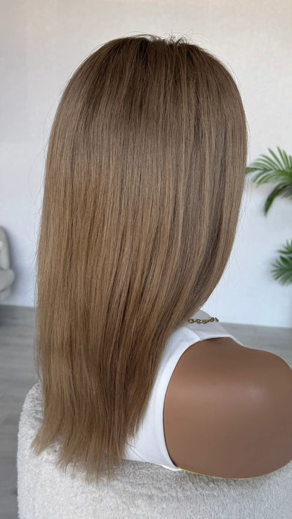 back view of lacefront human hair wig showing hair colour, soft ombre blonde, glueless wigs.