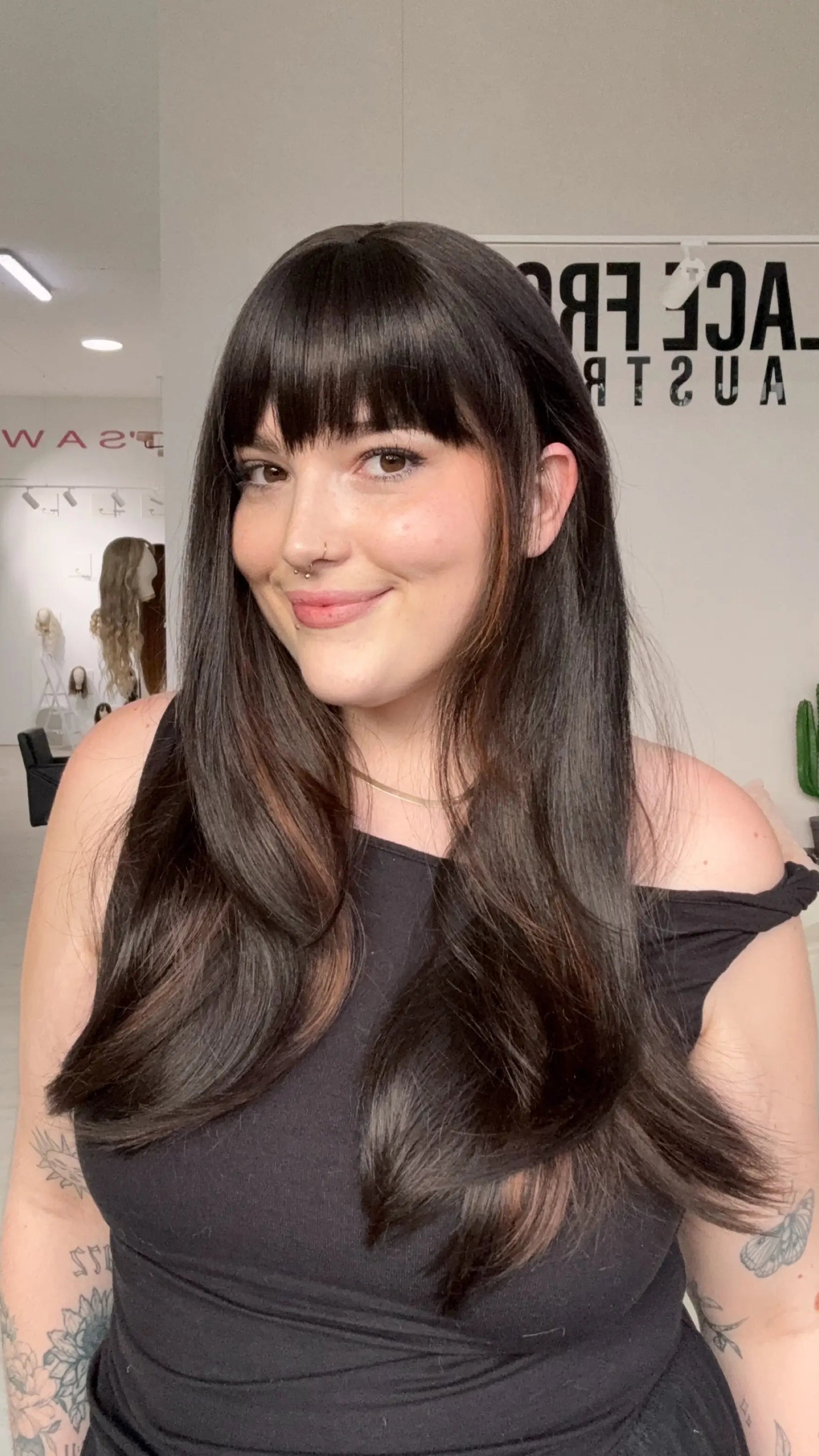 natural looking dark brunette synthetic wig with a glueless beginner cap, easy to wear.