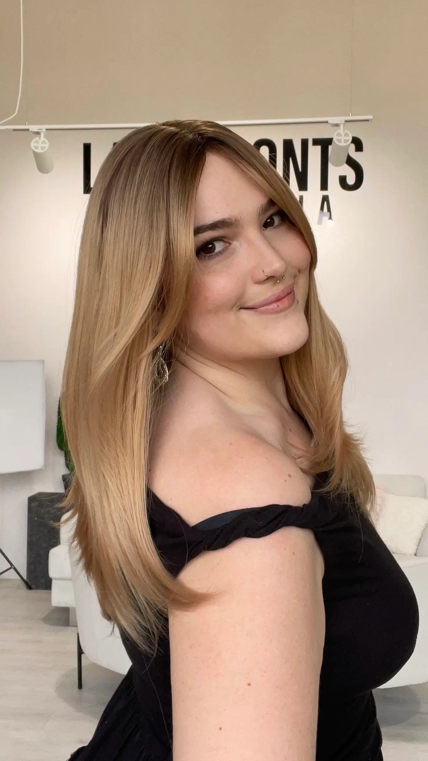 a glueless wig for hairloss, blonde ombre colouring with layers and curtain bang styling