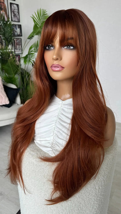 synthetic wig copper, long length with slight darker root and fringe.