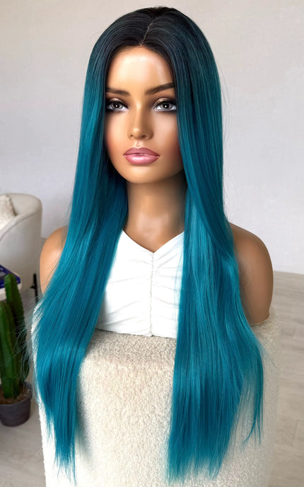 blue synthetic wig het safe, darker root to electric blue colour.