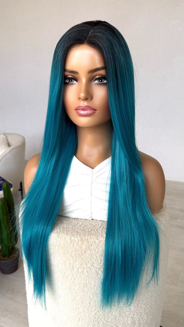 blue synthetic wig het safe, darker root to electric blue colour.