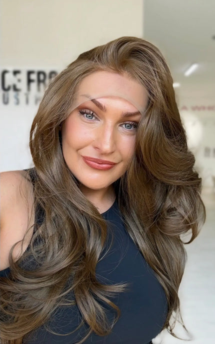 soft bouncy brunette lace front wig with layers throughout.