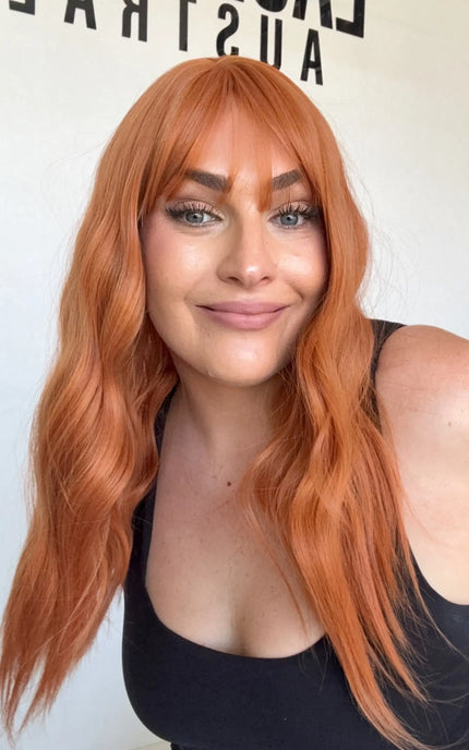 bright copper middle part fringe wig wavy hair, heat safe and glueless wigs australia.