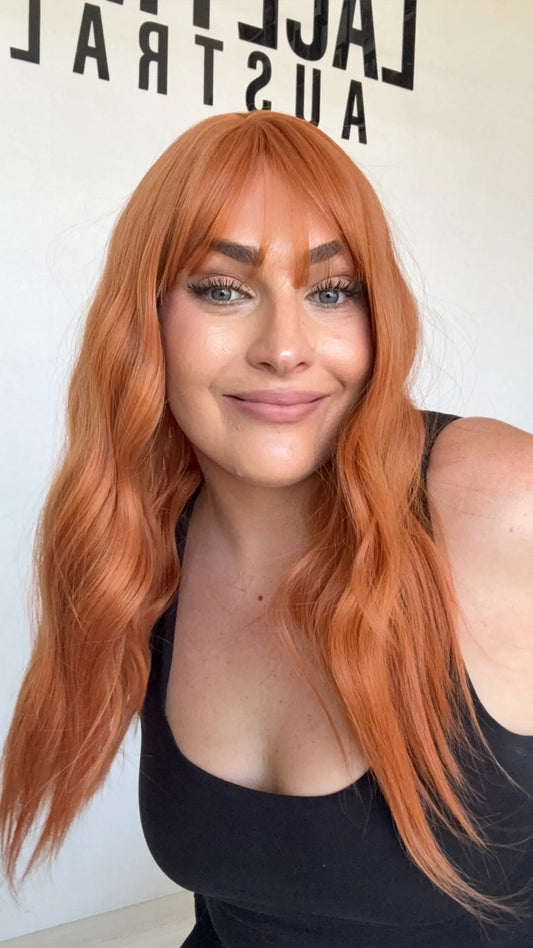 bright copper middle part fringe wig wavy hair, heat safe and glueless wigs australia.