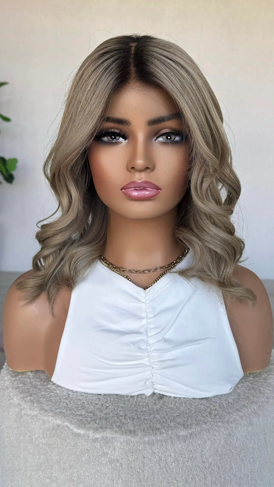 brazilian human hair wig, ash blonde with dark root, 16 inch length curled. made in australia.