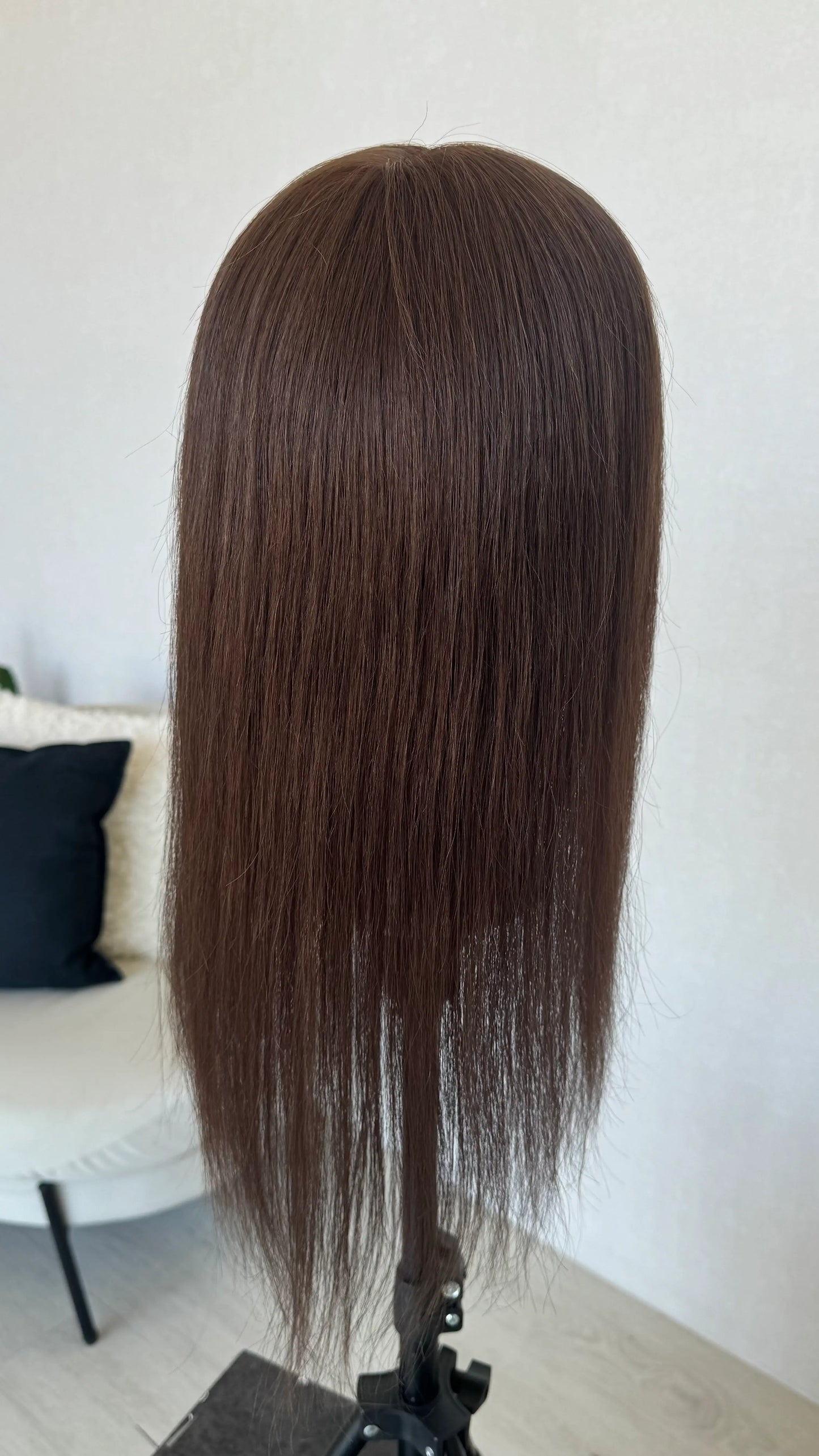 brunette wig on stand shwoing hair length