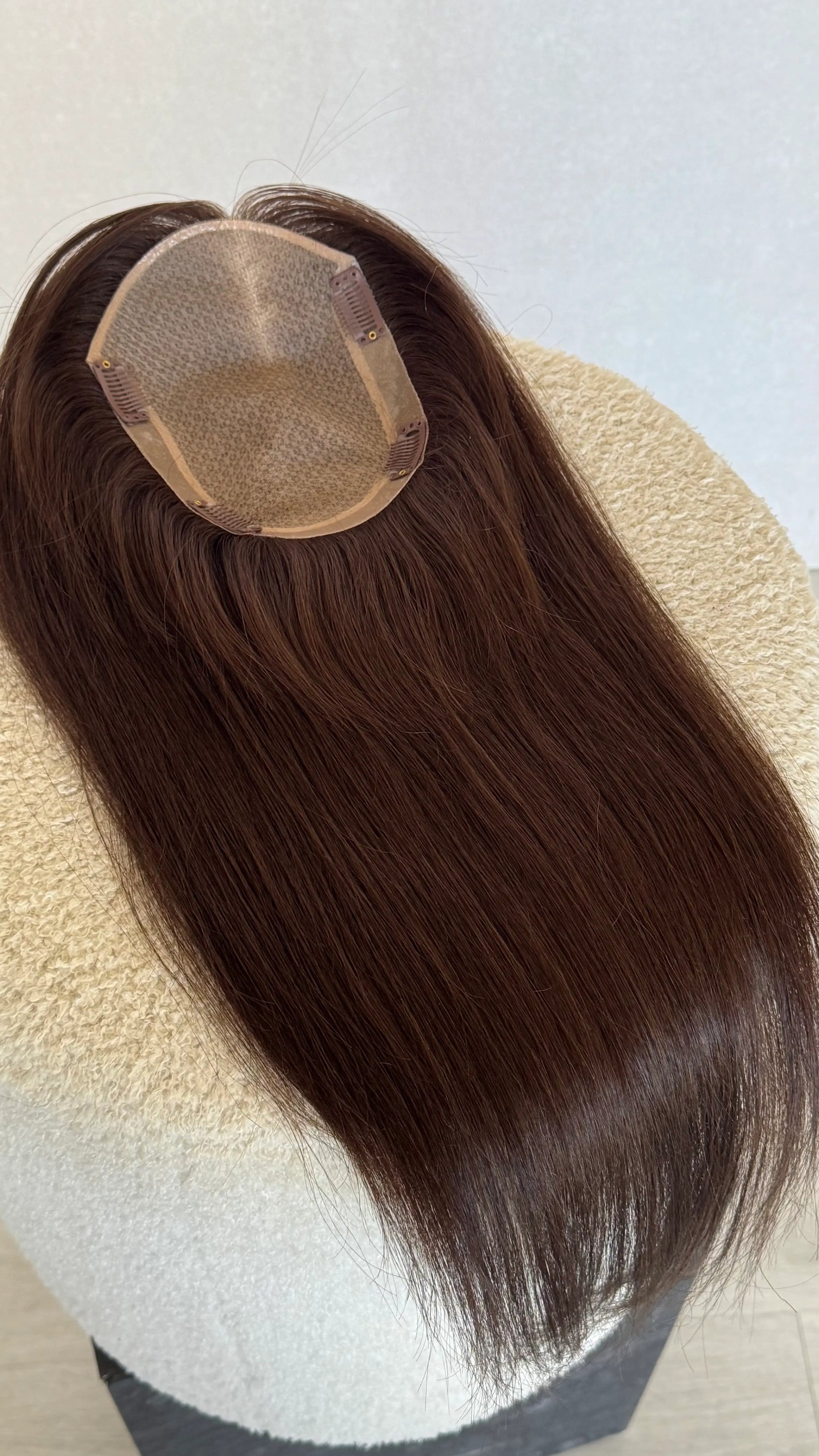 7x5 inch base with brunette human hair topper