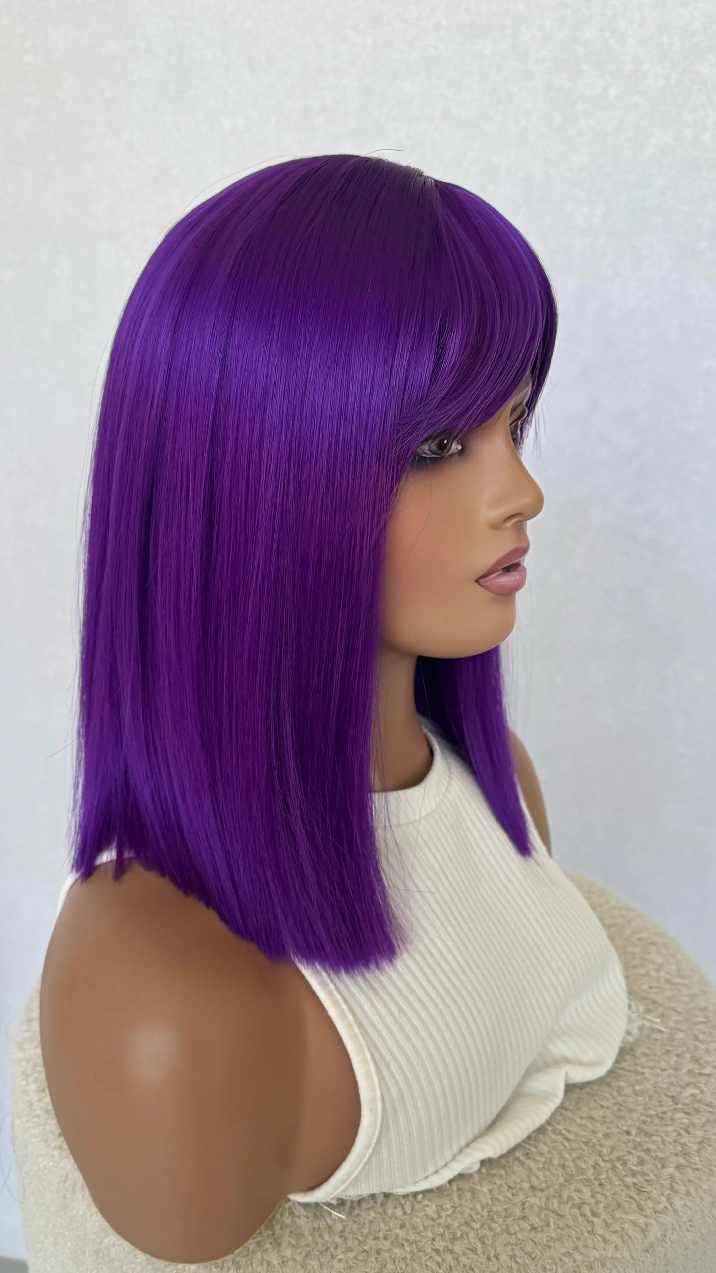 purple heat safe wig, synthetic hair, middle part with fringe.