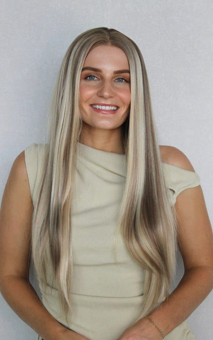 synthetic wig, front on, showing natural hair colours. heat safe wigs. styling hair.