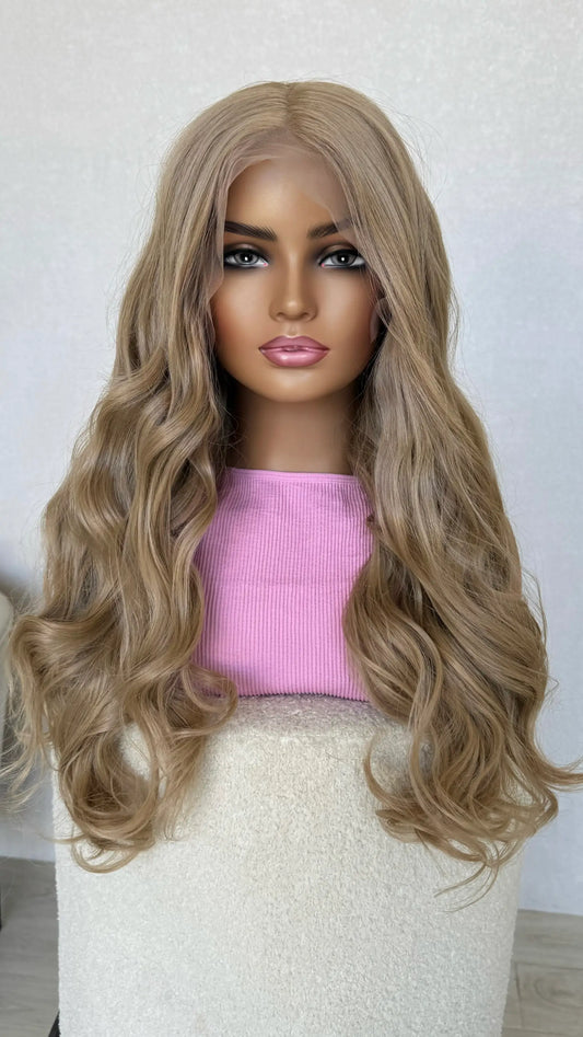 Blonde wig on a mannequin head with a pink top against a white background, australia