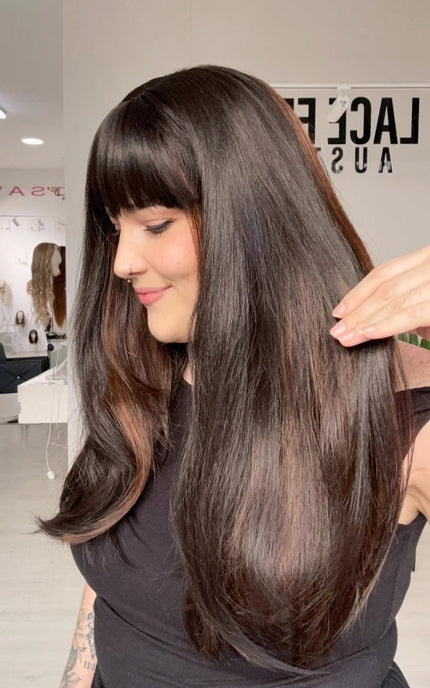 heat safe dark brown wig with warm highlights and blunt fringe, australia.