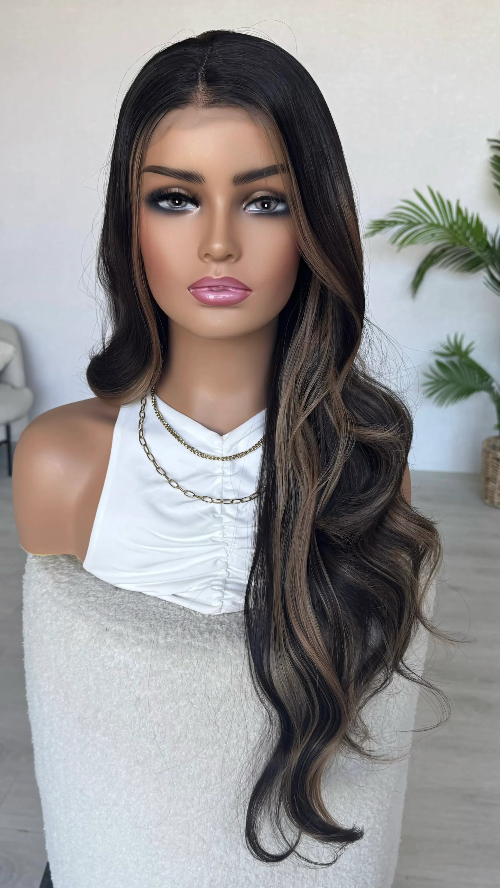 half hair back, dark brown lace front wig. highlights around the face, curly hair, wavy hair.