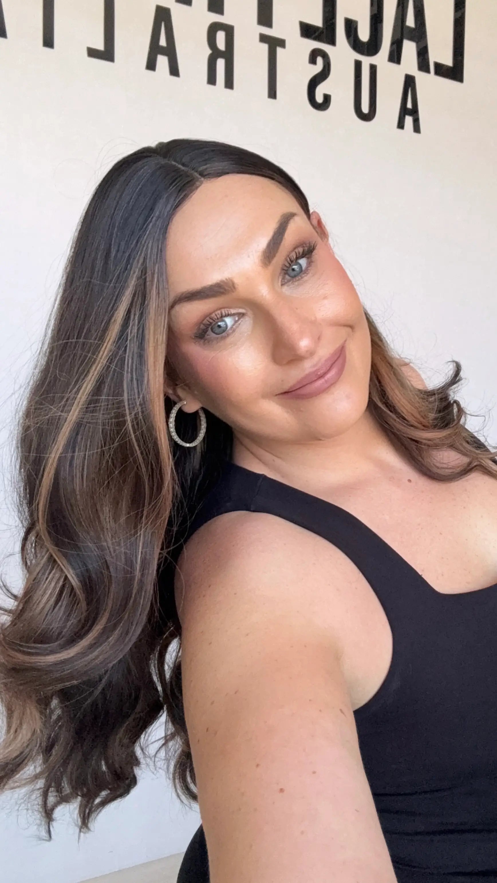 heat safe, glueless synthetic, middle part , long hair, dark brunette with highlights.