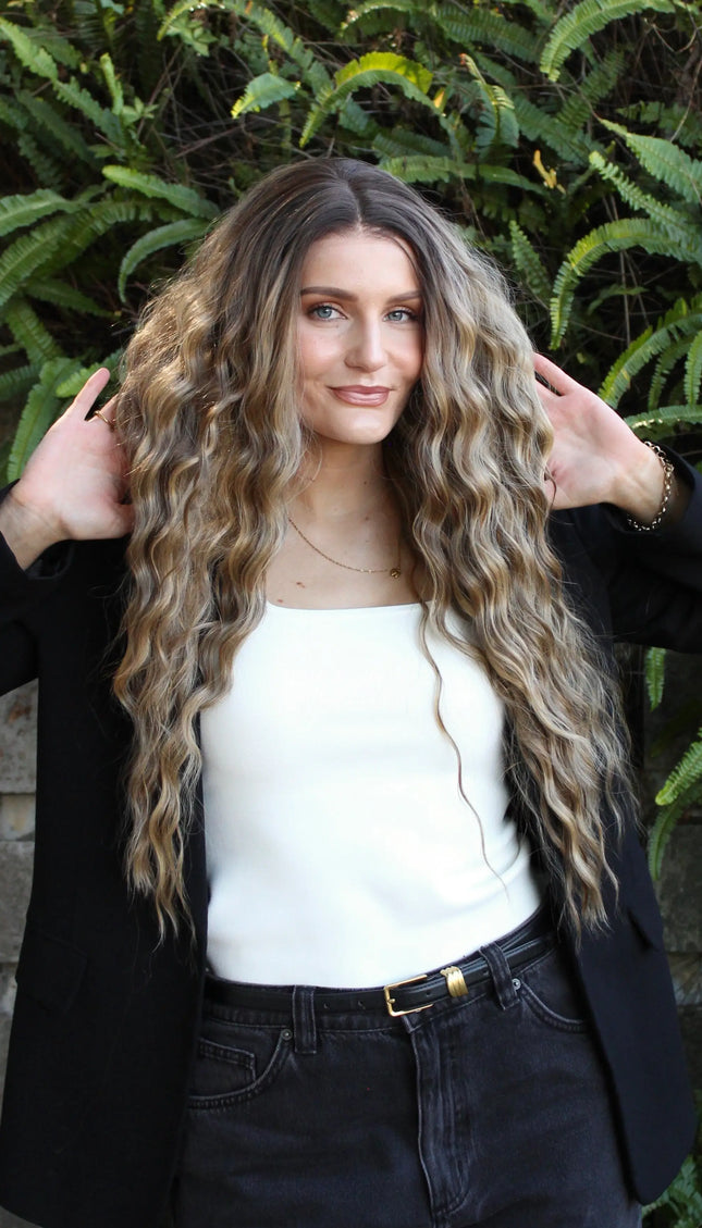 Heat safe synthetic hair, long lacefront wavy hair wig, middle part with highlights.