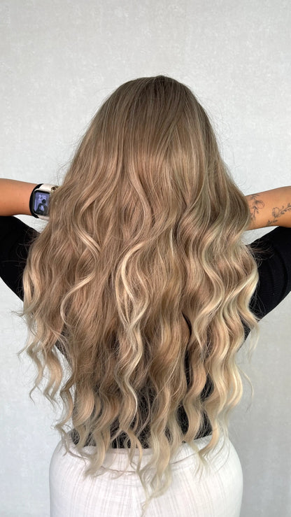syntheic wig from the back , natural ash hair colour. balayage