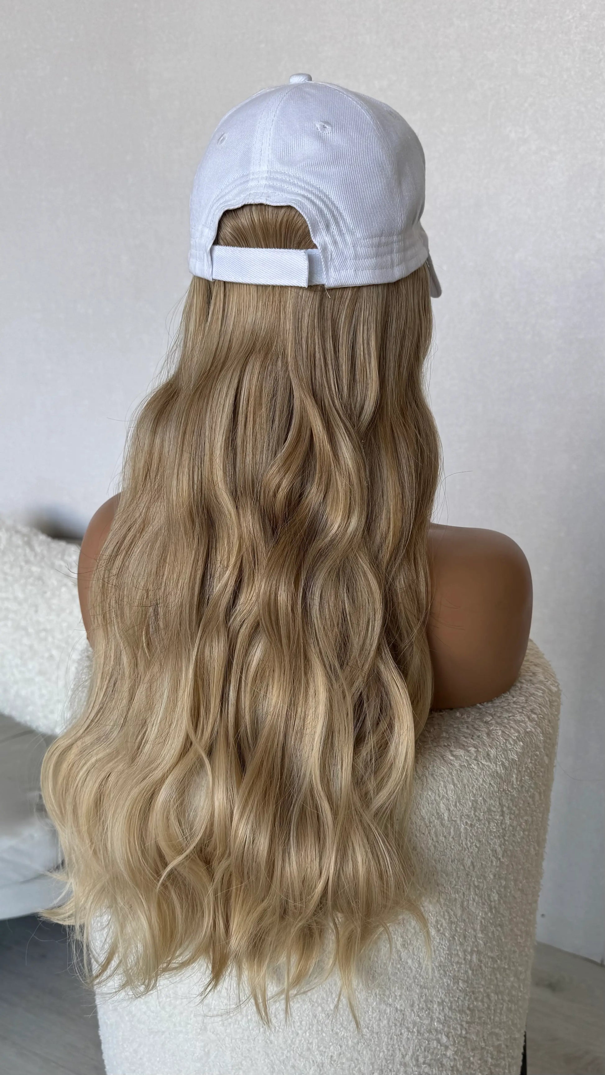 wigs australia, from back view, long wavy blonde heat safe hair.