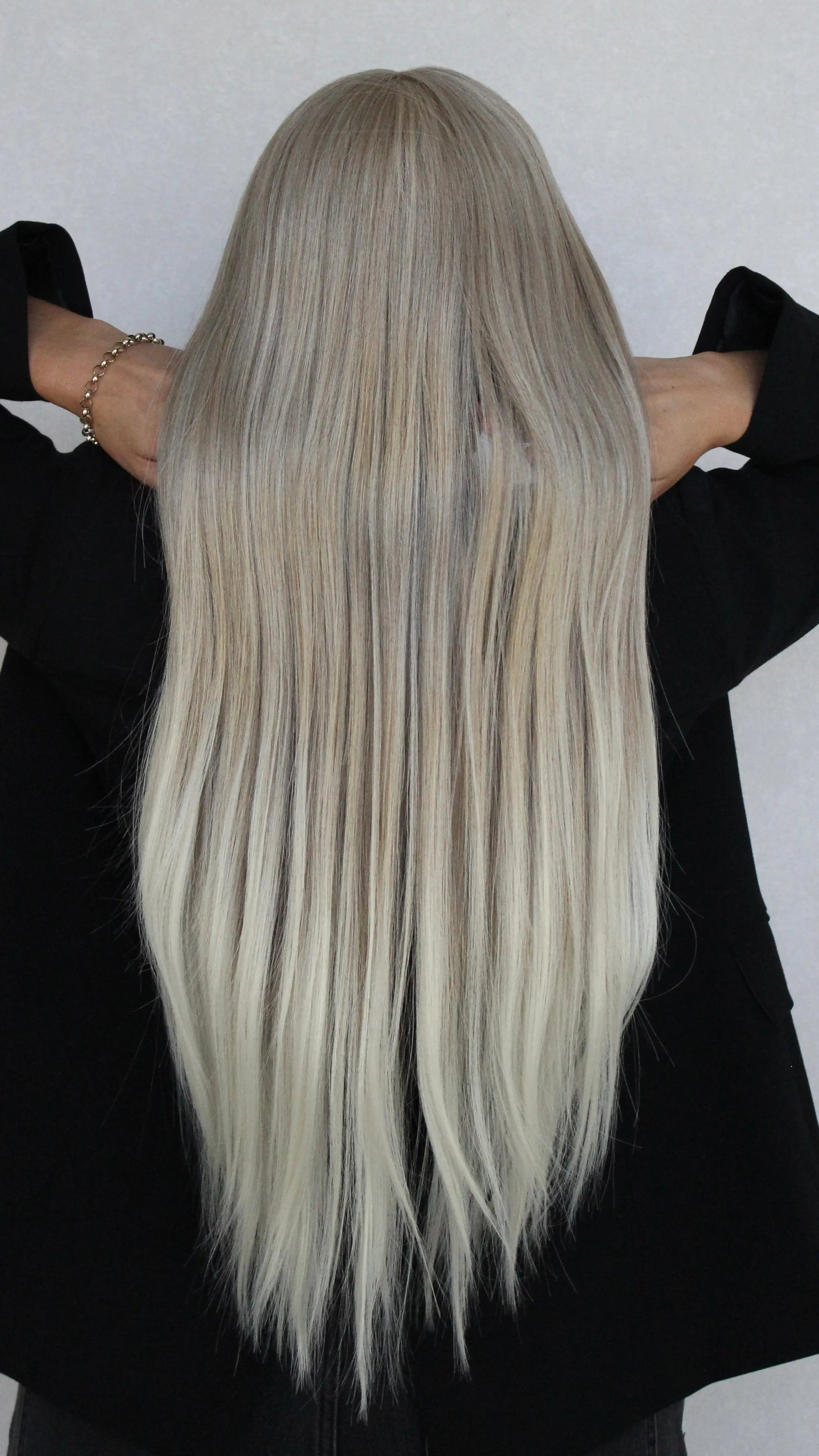 from behind angel synthetic, long length hair, white blonde.