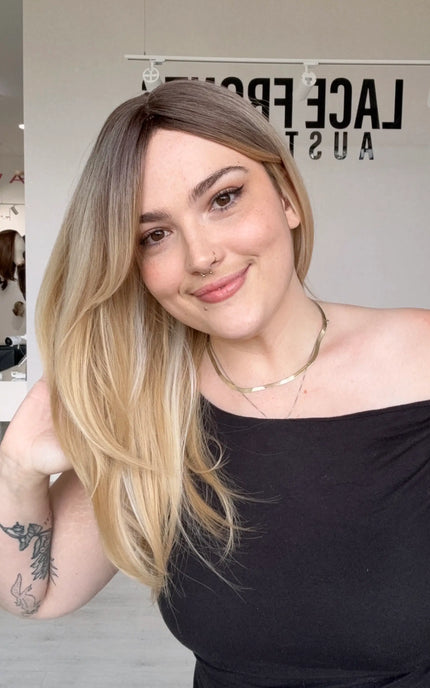a blonde ombre synthetic wig with heat safe fibres for easy styling, layered straight hair wig with warm vanilla blonde ombre colour.