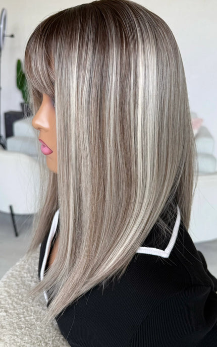 highlighted ash blonde silver hair wig with fringe. 