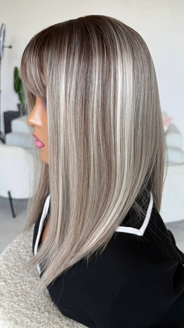 highlighted ash blonde silver hair wig with fringe. 