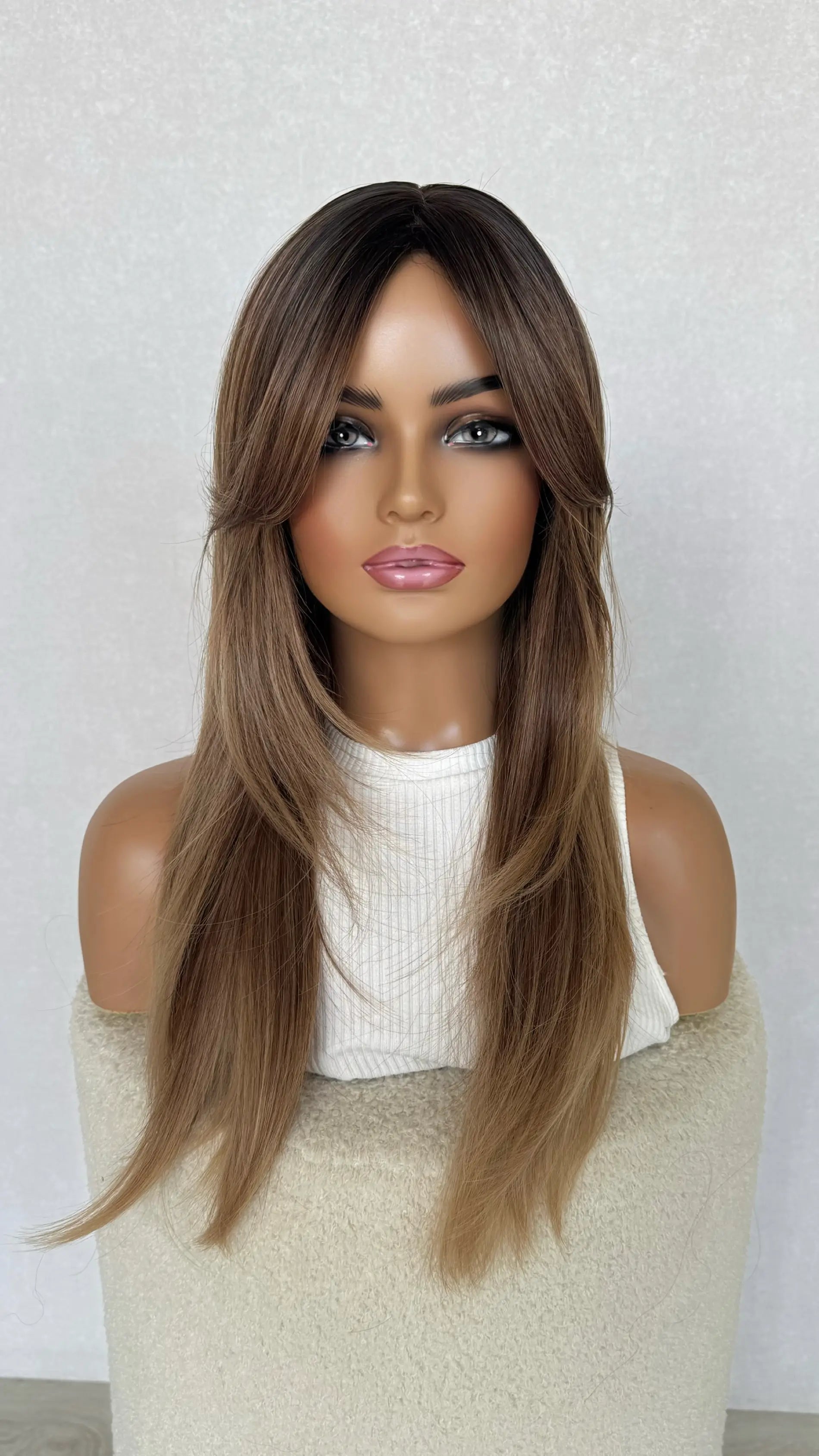 curtain bang synthetic, heat safe and glueless wig.