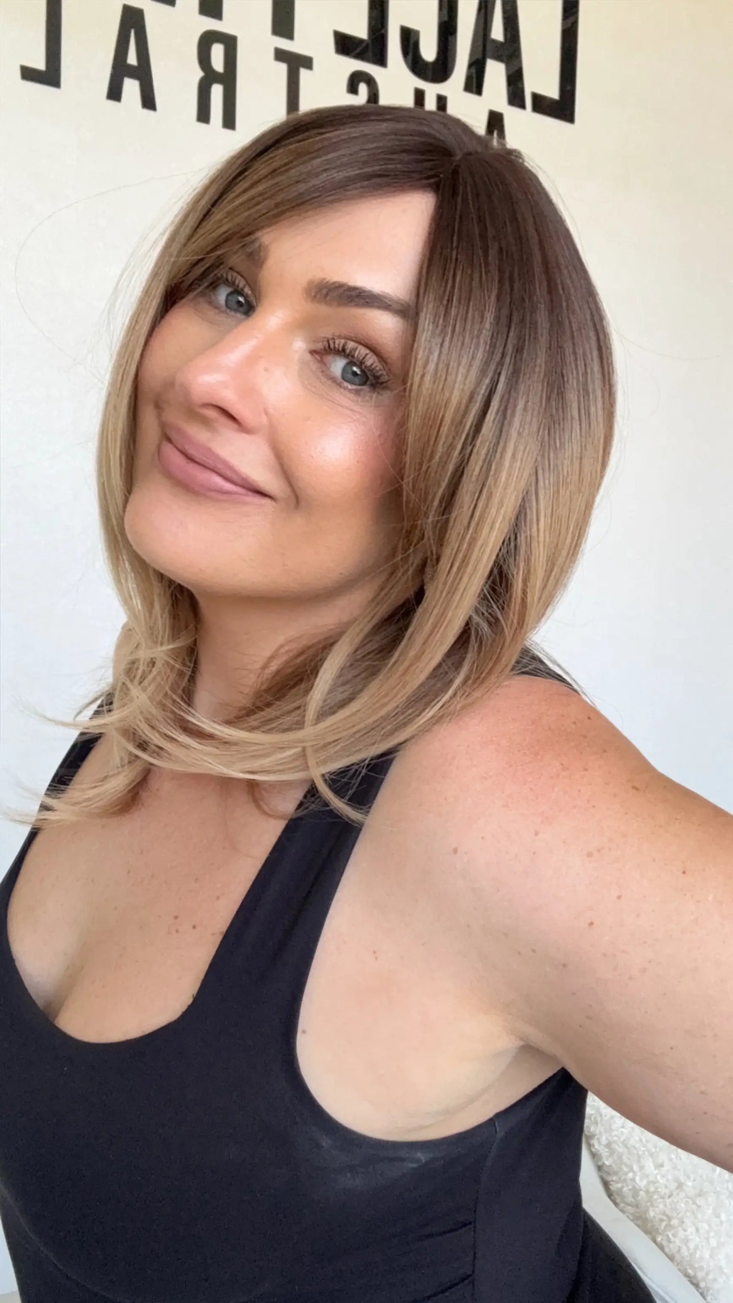 middle part, layered ombre hair, synthetic wig heat safe and glueless. curtain bangs.