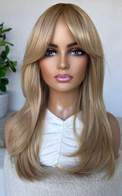 golden blonde middle part with layers