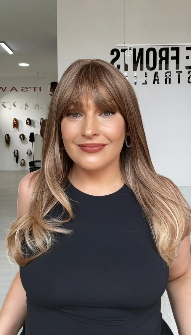 light brunette golden hair with fringe and middle part, straight hair wig with heat safe fibres for easy styling and wear.