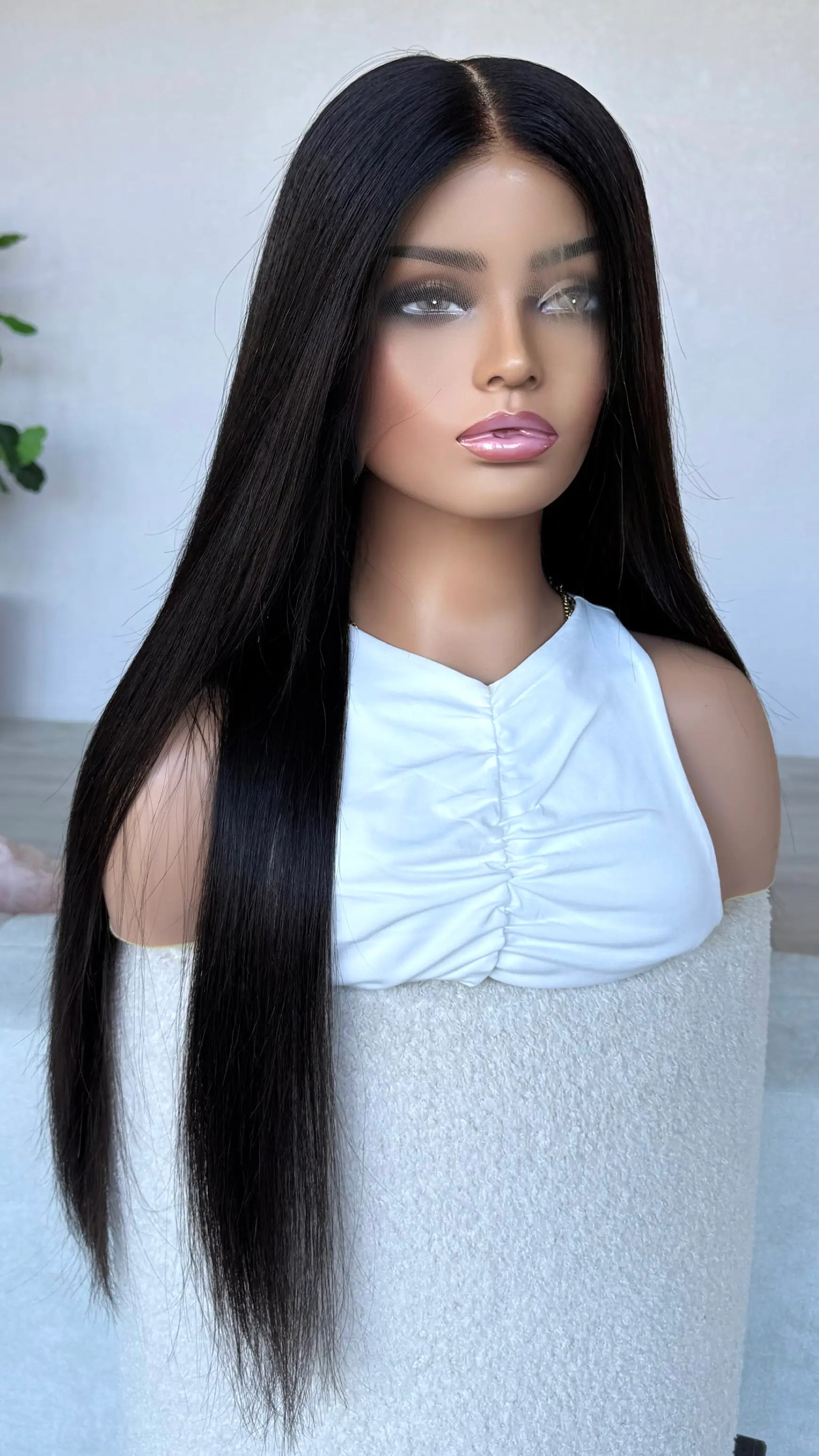 black hair, middle part, 26. 