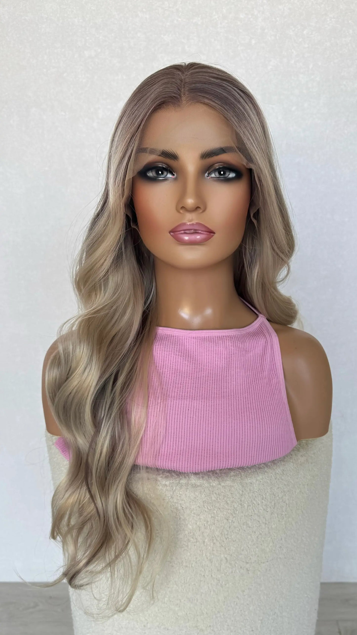 half hair back darker root to dimensional ash blonde synthetic wig.