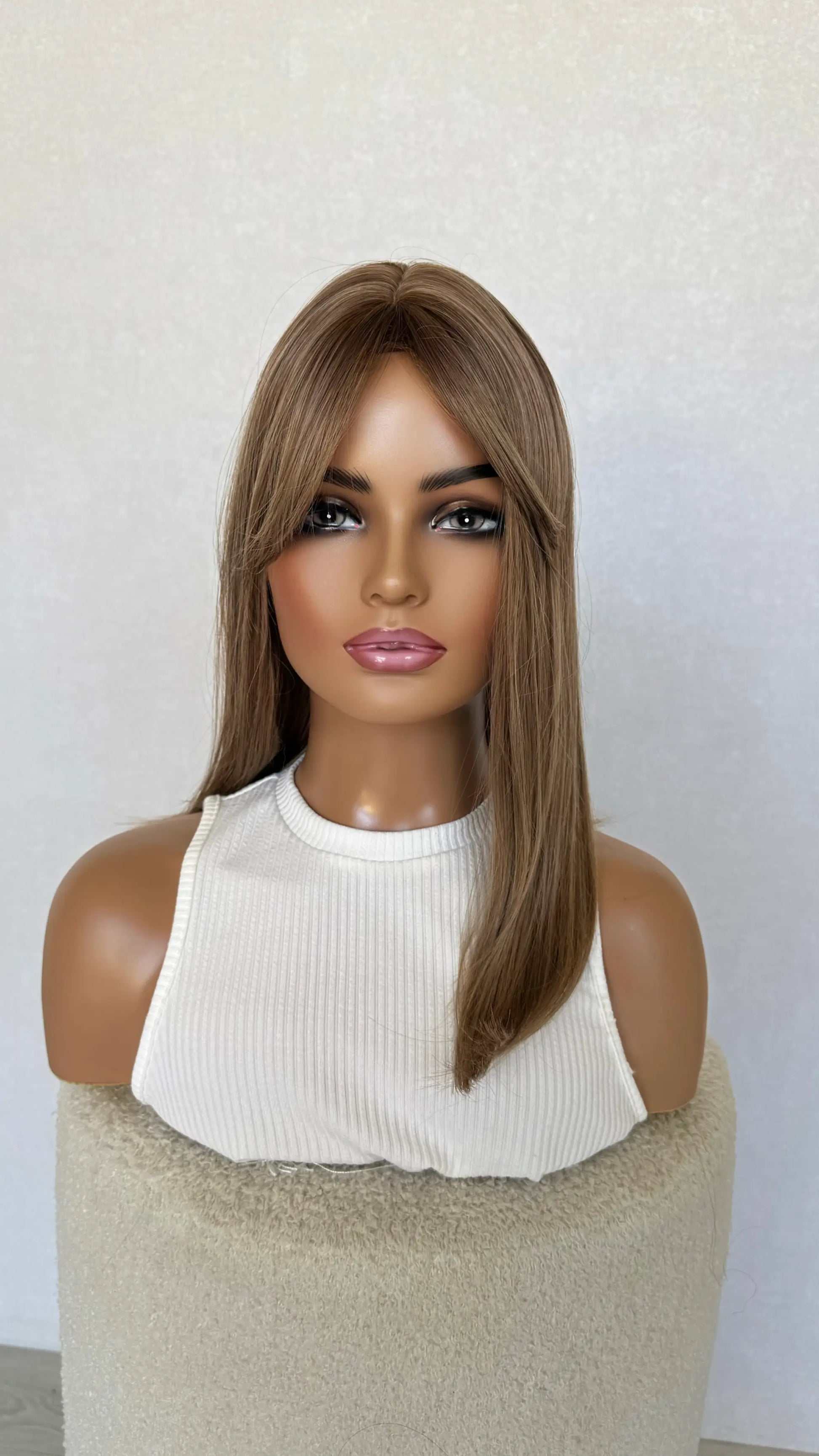 half hair back half forward, middle part. 