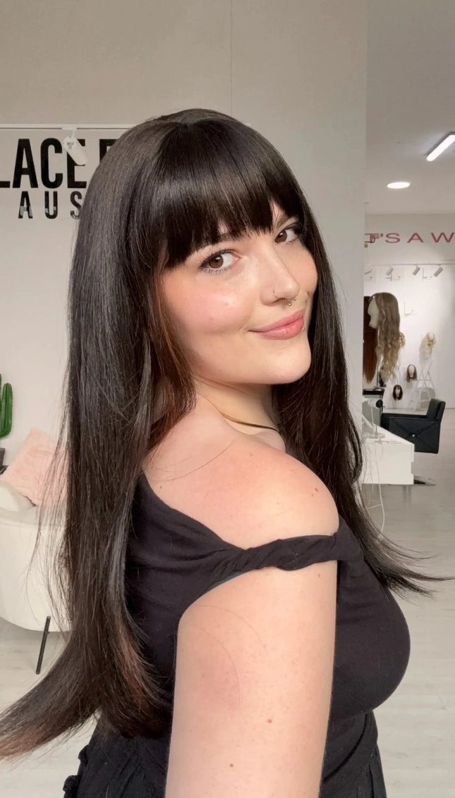 heat safe long dark brunette synthetic wig.with chesnut highlights and fringe.