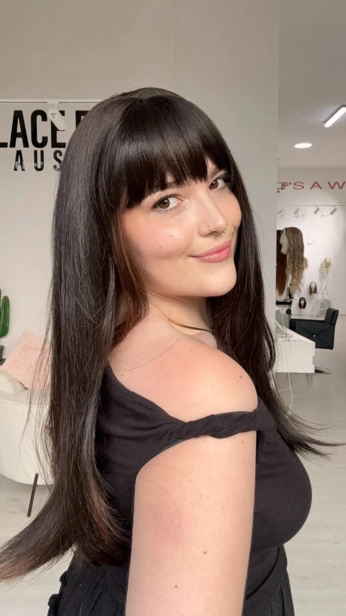 heat safe long dark brunette synthetic wig.