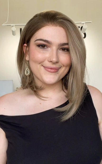 a heat safe glueless dark blonde bob length synthetic wig for hairloss.