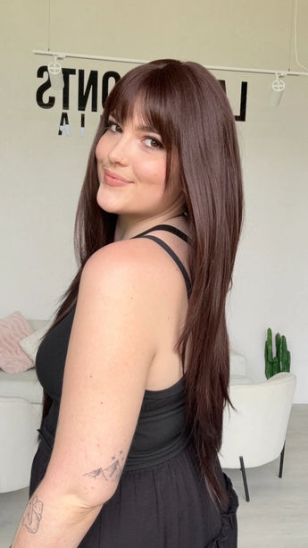 long layered burgundy synthetic wig with a glueless cap for easy everyday wear.